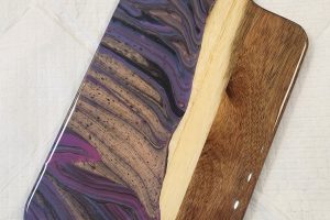 Wooden charcuterie board painted and swirled with your favorite colors at Hawaii Fluid Art Tinley Park.