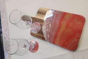 Fluid art wine glass and charcuterie board created at Hawaii Fluid Art in Tinley Park.